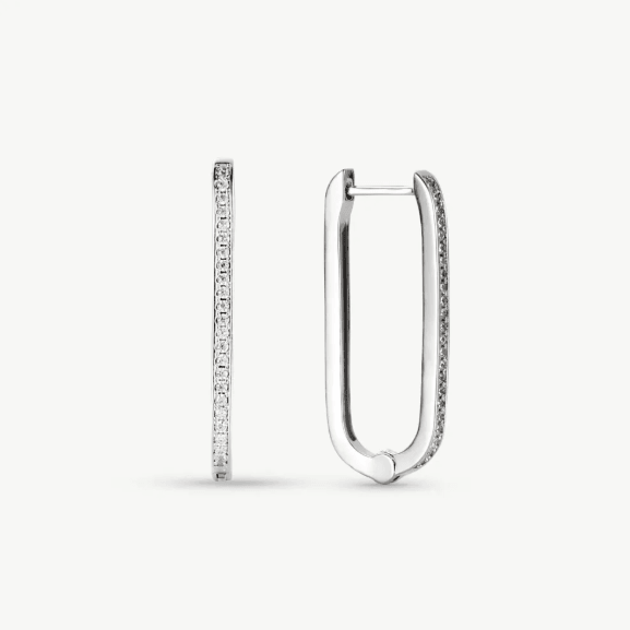 Stylish collection of small silver hoop earrings showcasing unique designs. Stylish collection of small silver hoop earrings showcasing unique designs.