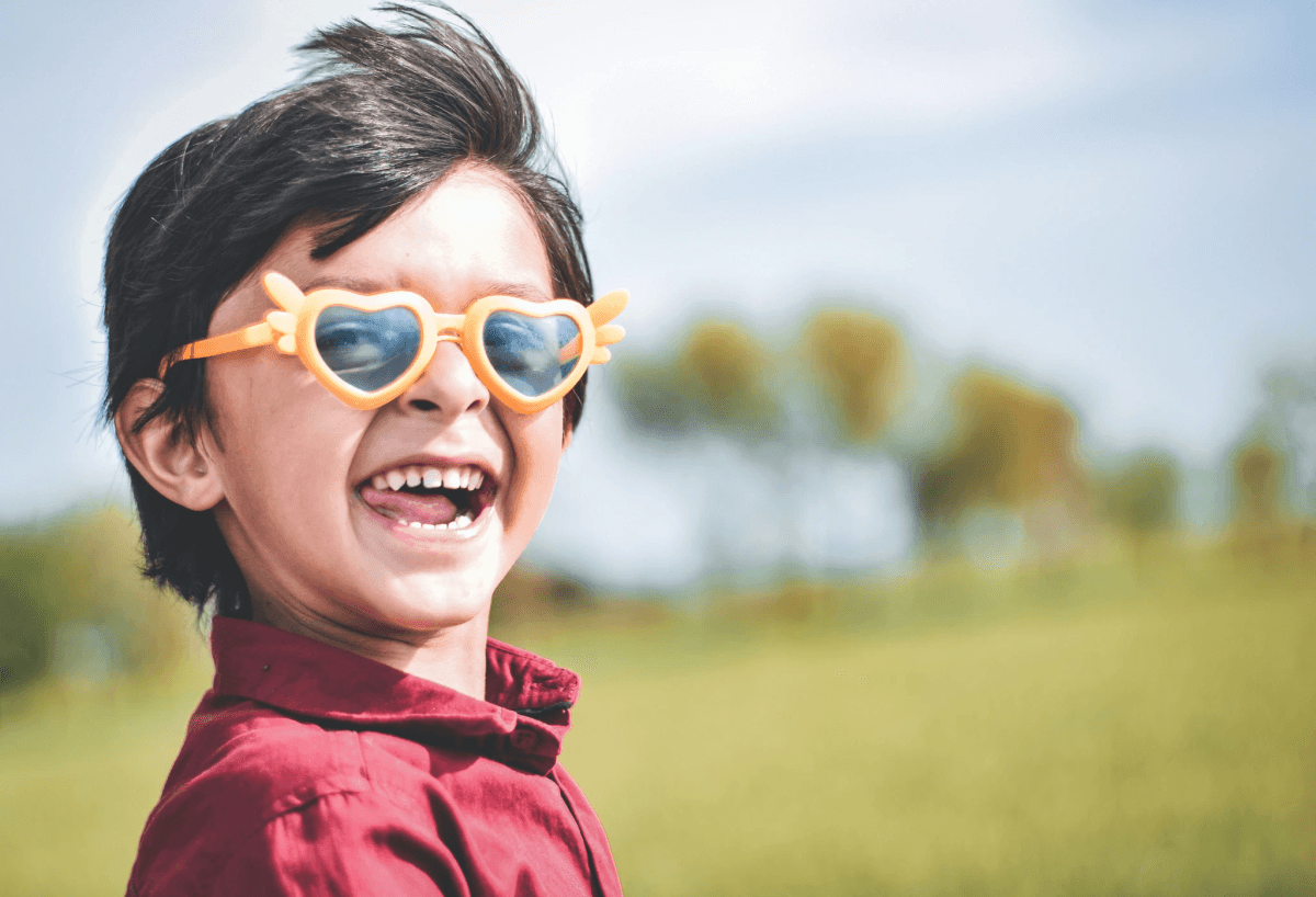 Kids wearing bulk black sunglasses enjoying outdoor activities. Kids wearing bulk black sunglasses enjoying outdoor activities.