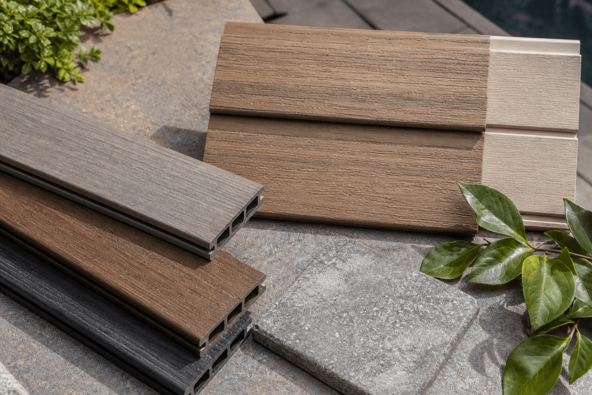 Composite panel and deck board samples compared outdoors Composite panel and deck board samples compared outdoors