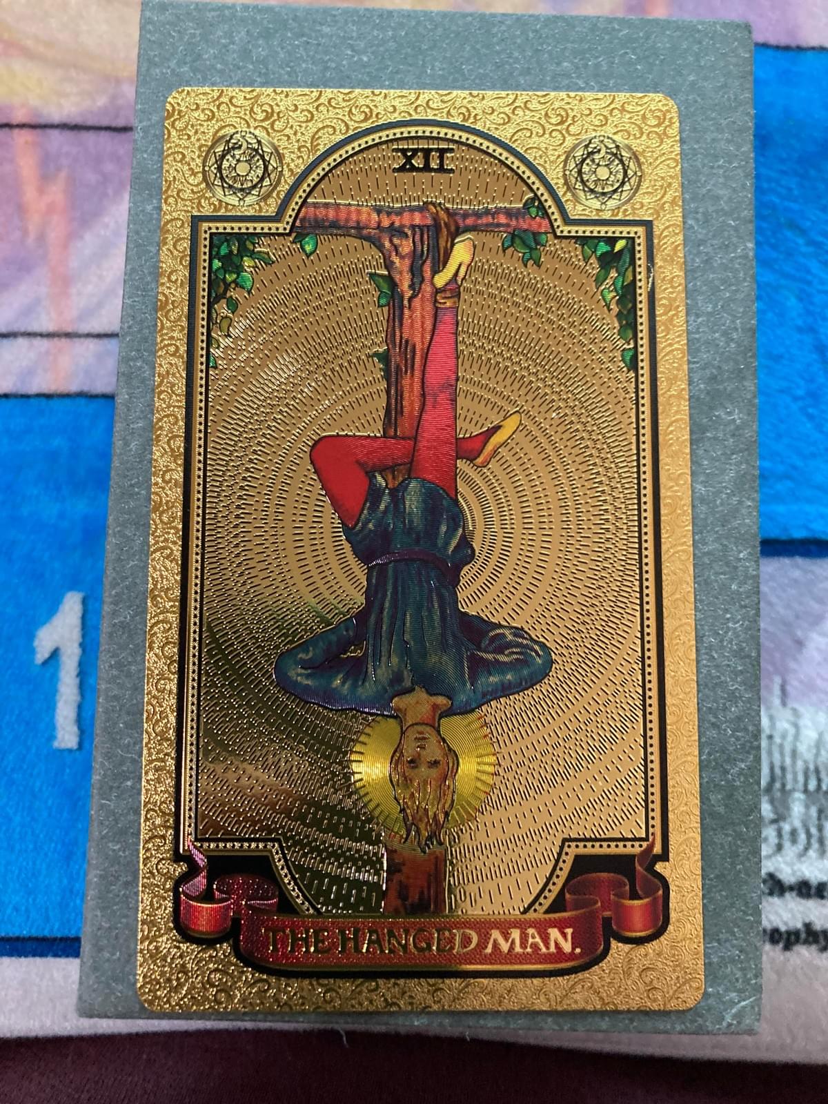 The Hanged Man Key 12- RWS Gold foil imagery of the inverted soul The Hanged Man Key 12- RWS Gold foil imagery of the inverted soul