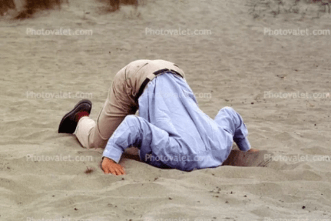 Head buried in the sands of time imagery Head buried in the sands of time imagery