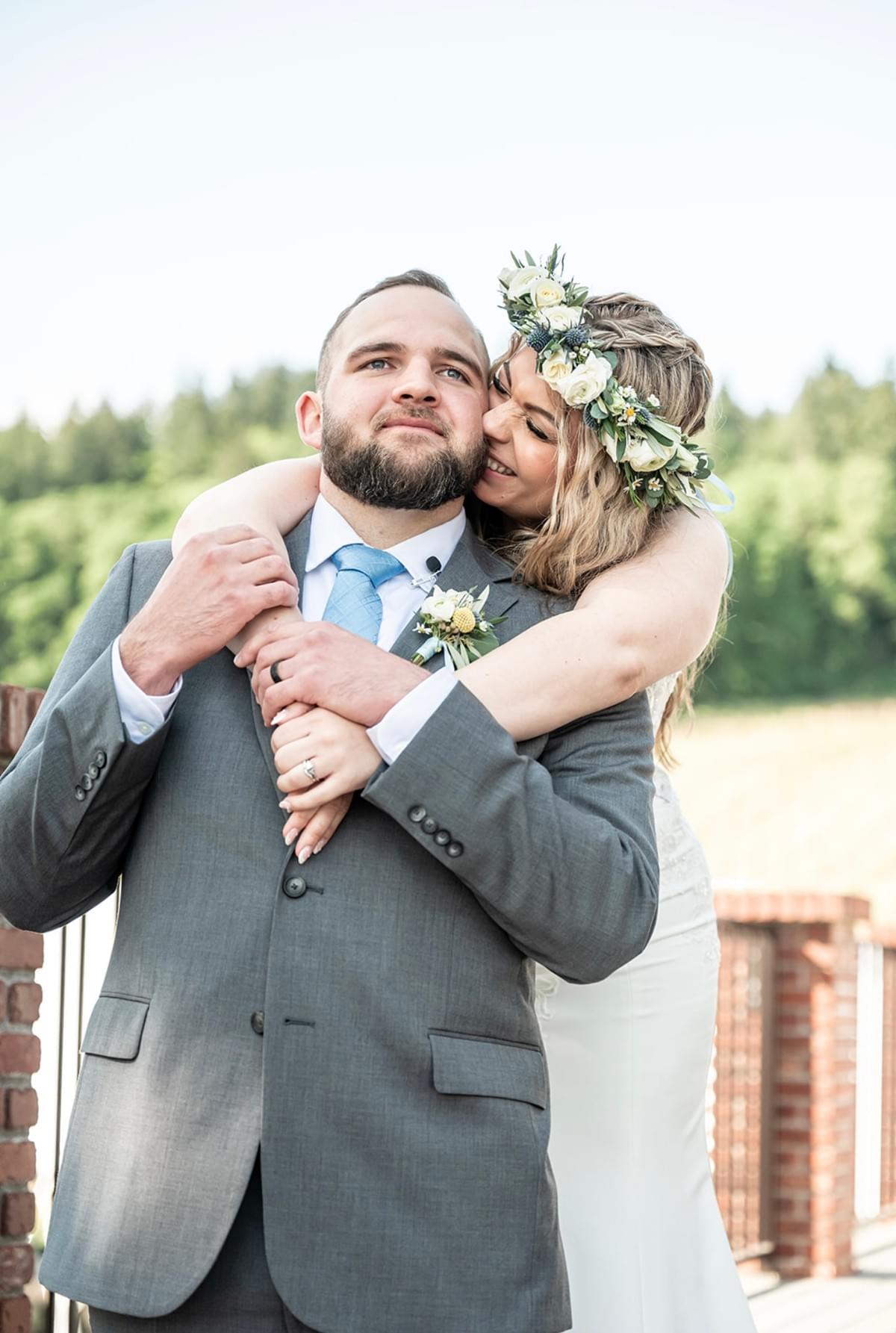 a bride and groom smiling at each other as they walk back up the aisle a bride and groom smiling at each other as they walk back up the aisle