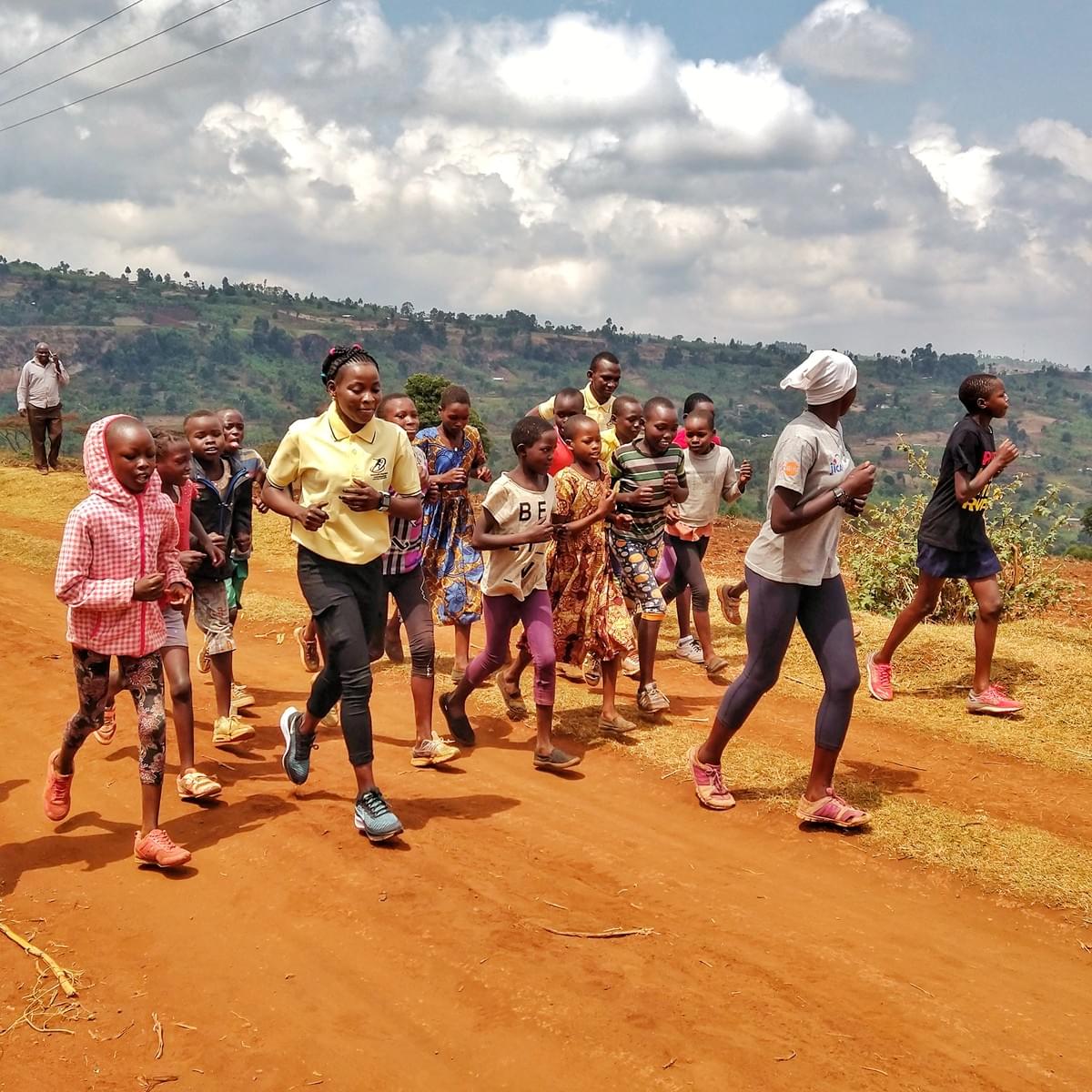 Ugandan Olympic 800 metre champion Halima Nakaayi runs with young athletes in Kapchorwa, Uganda Ugandan Olympic 800 metre champion Halima Nakaayi runs with young athletes in Kapchorwa, Uganda
