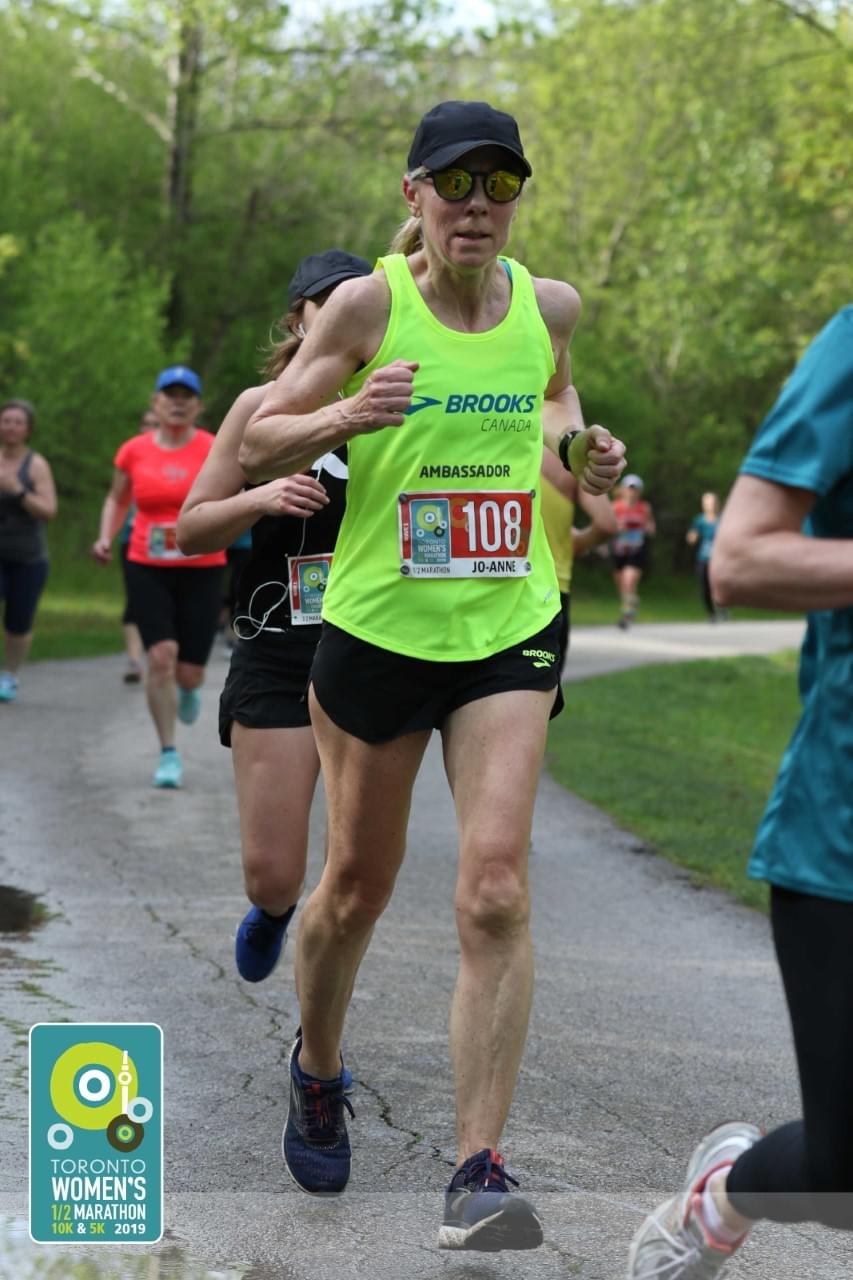 A runner takes part in Toronto Women's half marathon race A runner takes part in Toronto Women's half marathon race