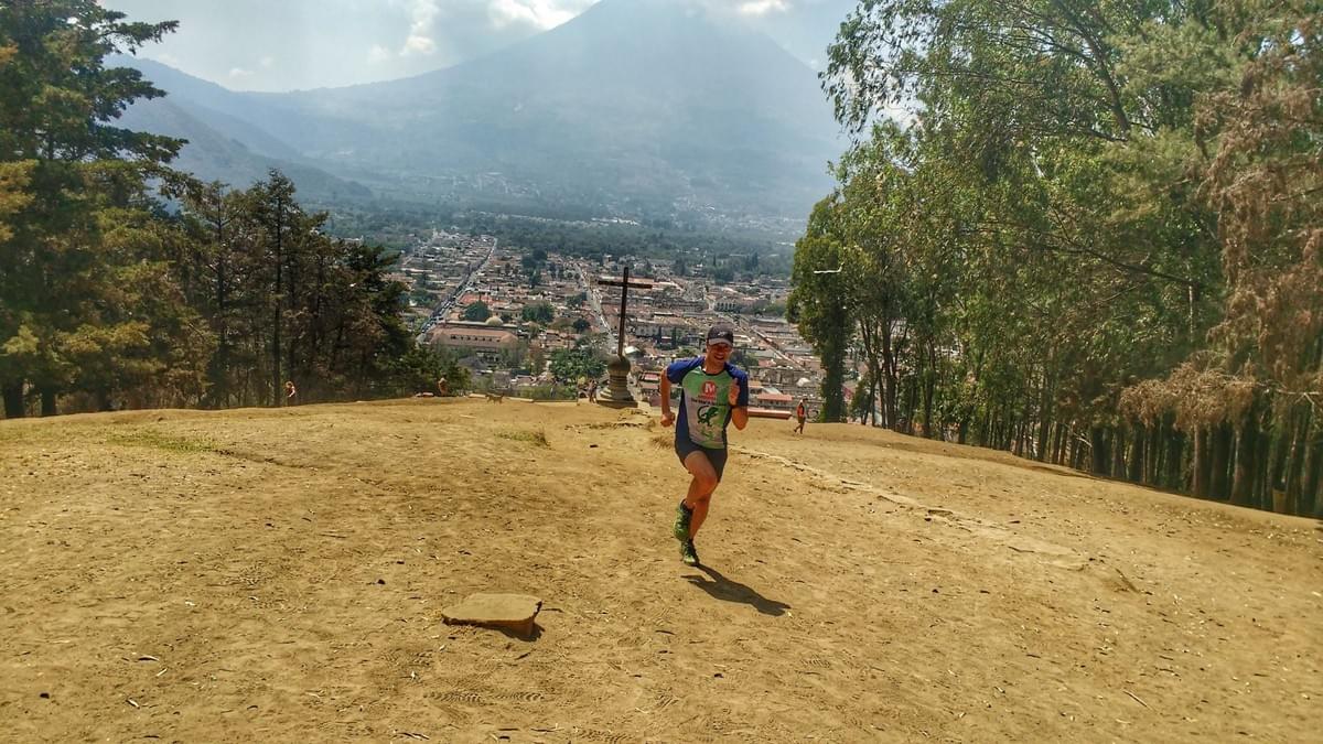 Running up Cerro de la Cruz in Antigua, views of the city and Volcán de Agua in the background Running up Cerro de la Cruz in Antigua, views of the city and Volcán de Agua in the background