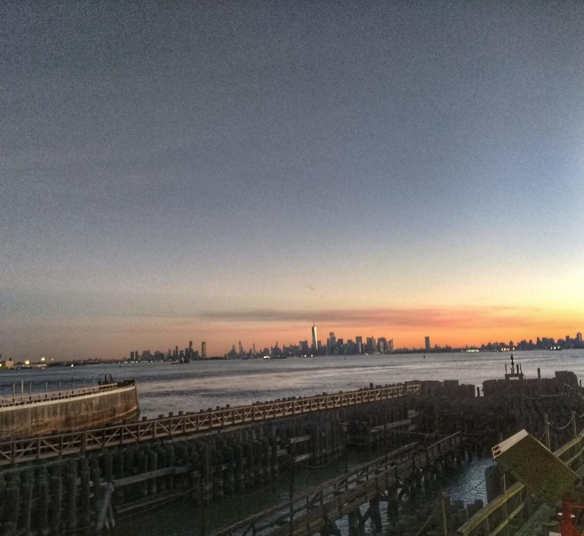 View of Manhattan from Staten Island ferry terminal at sunrise View of Manhattan from Staten Island ferry terminal at sunrise