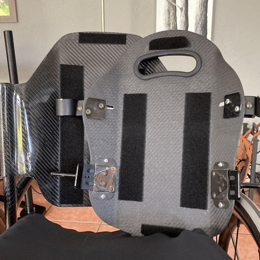 Image showing the newly created carbon fibre part and the original part Image showing the newly created carbon fibre part and the original part