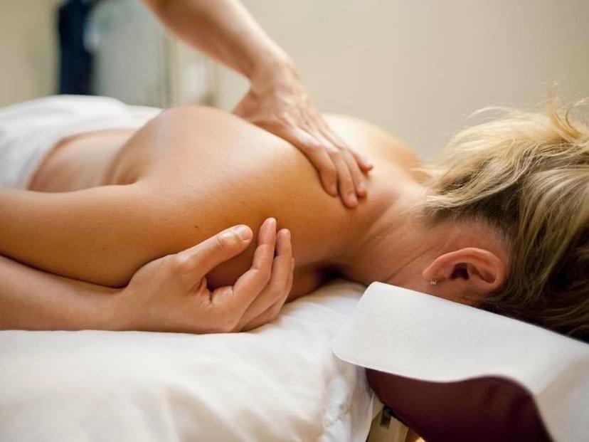 Image of a Woman Getting Shoulder Massage Image of a Woman Getting Shoulder Massage