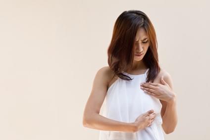 Image of Woman Examining Her Breast Image of Woman Examining Her Breast