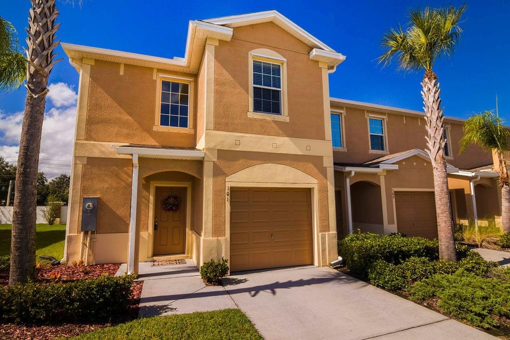 2 story condo with orange and yellow coloring 2 story condo with orange and yellow coloring