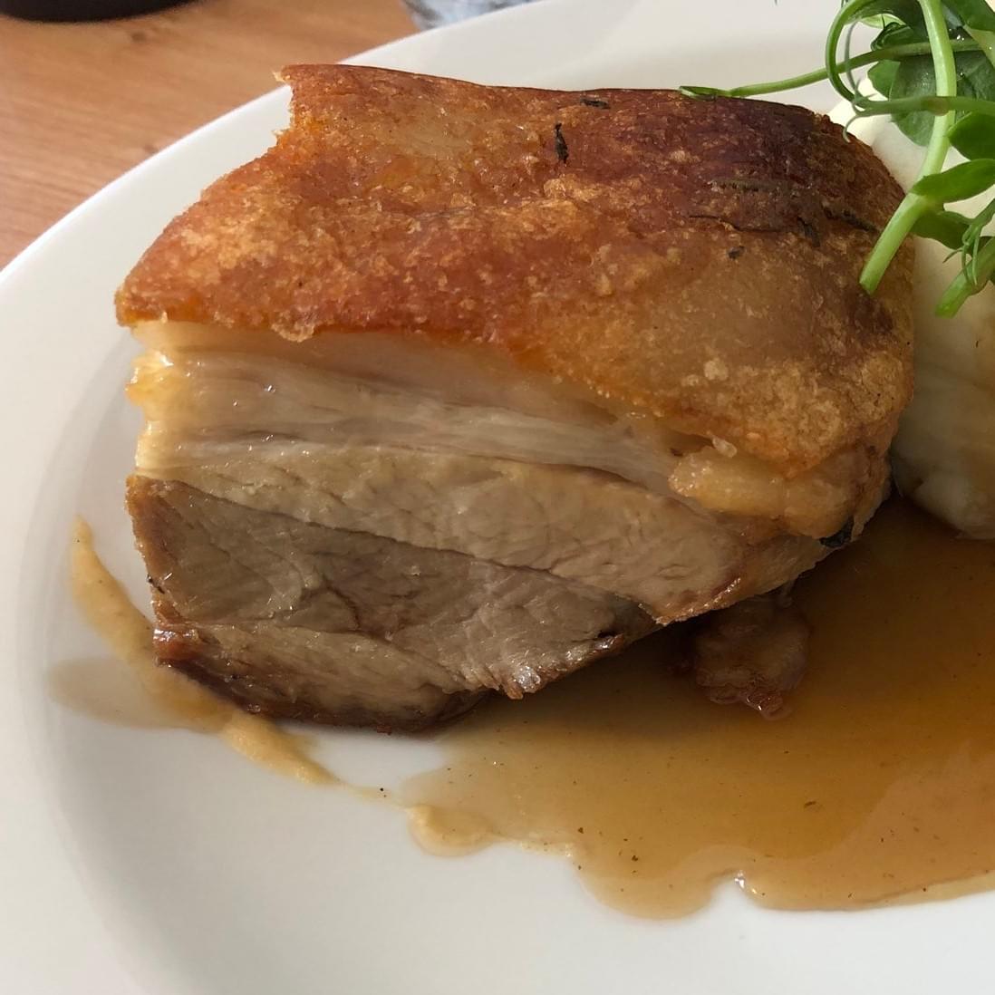 Crispy pork belly in apple sauce