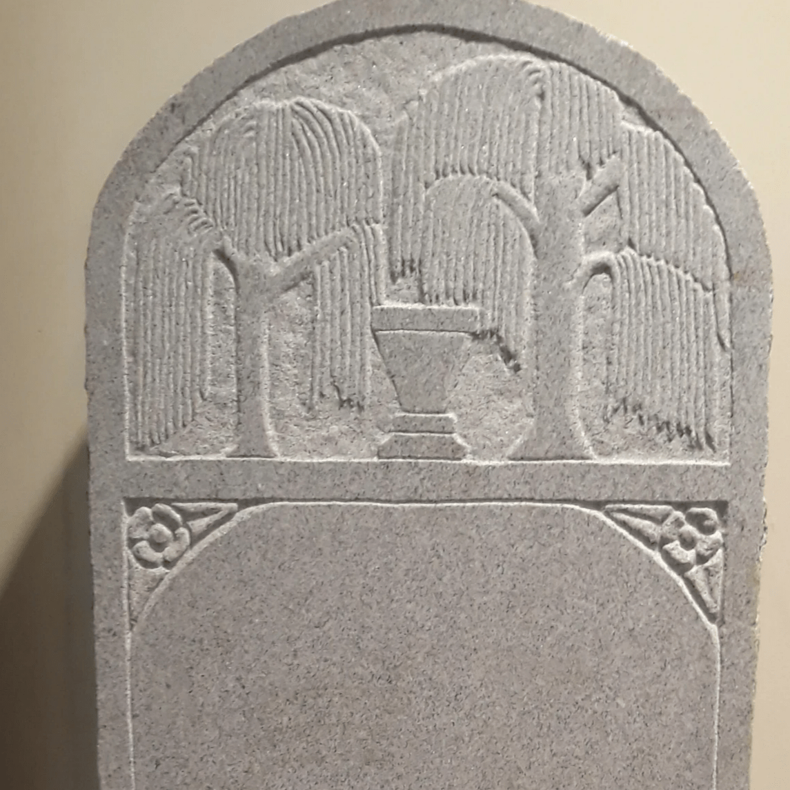 Granite willow and urn gravestone