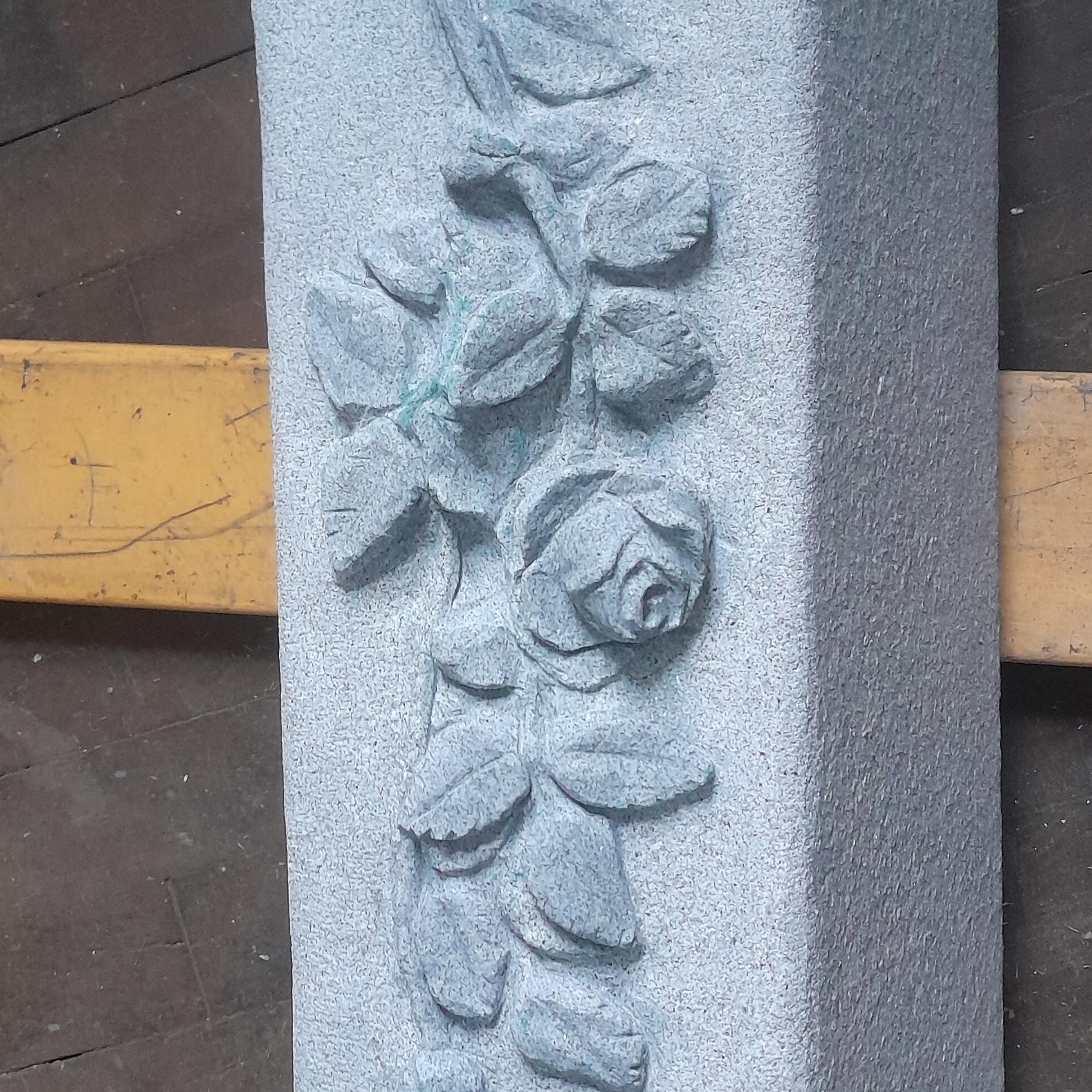 Bouquet of Roses atop Granite Headstone