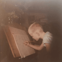 Drawing a house in the mountains on my new easel