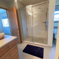 New walk-in tiled shower