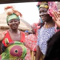 Women artisans happy & waving