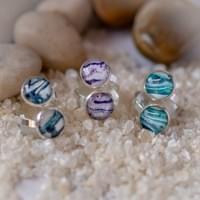 Double ring on adjustable band in a variety of colours