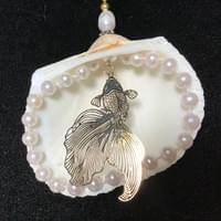 Handmade tree ornaments and jewelry.