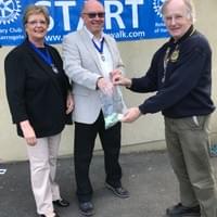 THe Deputy Mayor of Pateley Bridge and President Maurice of Harrogate Rotary make the draw for the winning raffle number.