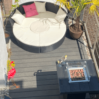 Outside terrace with lounge bed and bartable fireplace