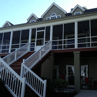 Beautiful and welcoming screened porch