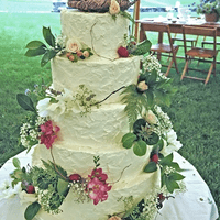Rustic Buttercream Wedding Cake with Fresh Flowers and Fruit