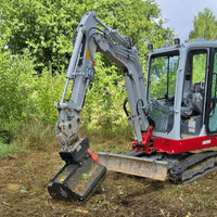 Minipelle avec broyeur rotatif