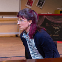 As Logan in The Thanksgiving Play