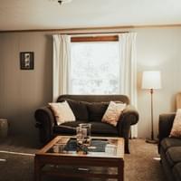 Spacious master bedroom with queen bed