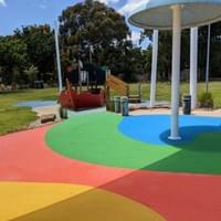 Colourful playground with softfall floor surfaces