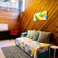 Updated sofa/bed in the loft. Sleeps one or unstacks to sleep two.