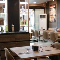 Copper Chimney interior view with a stylish dining setup
