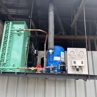 Industrial chiller compressor system control and maintenance
