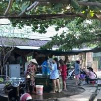People getting water the well 