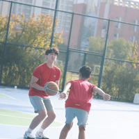 Practicing drills with teammates, always pushing limits.