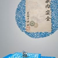 Ebisu Dust, 2011, paper charm, eraser shavings