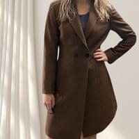 Tailoring styled for presence — client in a perfectly fitted coat-dress, accessorised by long blonde hair and big smile.