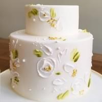 Modern flower with edible gold leaf cake