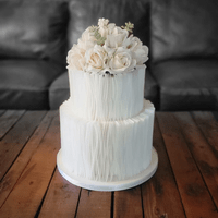 Bass relief and shimmer wedding cake