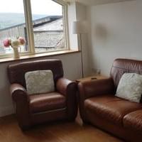 lounge, view over farm yard and beyond