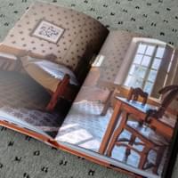 A totally re-built bedroom. The floor is the only original finishing but we designed and built the furniture, painted the wall motif, the lithography on the wall...