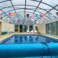 The Elmfield Heated indoor swimming pool with its new liner and roof for 2025