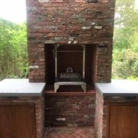 Asado Saltero installed in an outdoor kitchen in  Southampton USA