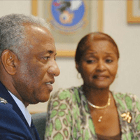 Retired Air Force Gen. Lloyd W. “Fig” Newton answers a question Friday morning at Vance Air Force Base while his wife, Elouise, looks on. Newton is a former wing commander at Vance. He spoke to Vance’s most recent pilot training graduates Friday morning.