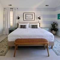 Primary: king bed + TV