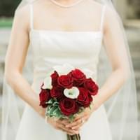 classic bridal bouquet featuring white and red roses