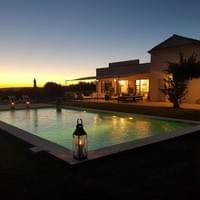 Watch the sunset from the heated pool