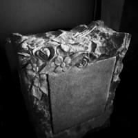 Rock pitched granite headstone