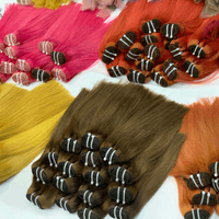 Applying temporary hair extensions with clip-in technique.