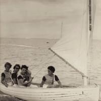 Shiplap wooden dinghy with Wet Hens aboard, circa 1964.